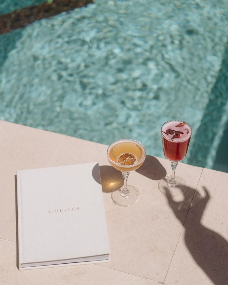 Airelles luxury poolside cocktails and editorial hospitality styling